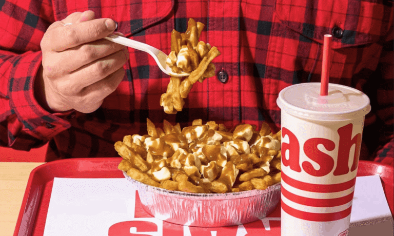 Quebec City’s Most Famous Poutine Chain Is Finally Opening in Montreal — And It’s Happening This Summer