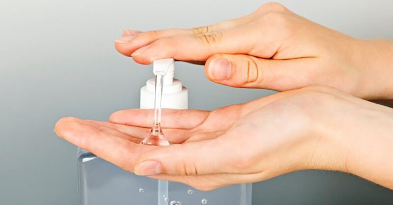 washing-your-hands-with-hand-sanitizer-min